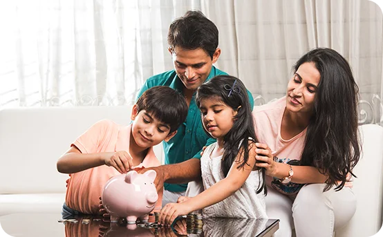 Family with piggy bank